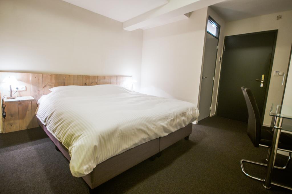 Hotel Taurus Cuijk Quarto foto