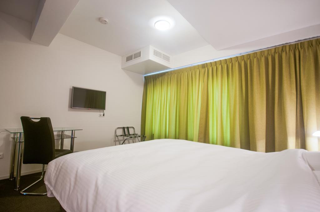 Hotel Taurus Cuijk Quarto foto